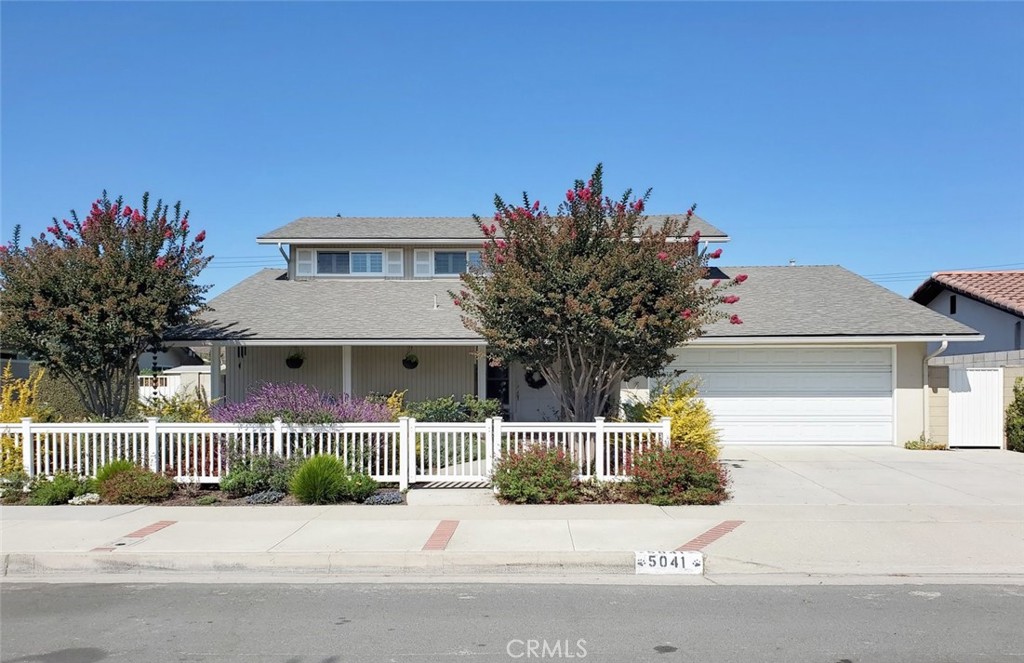 front view of a house with a street