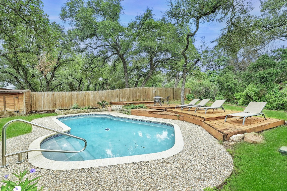 a view of outdoor space and swimming pool