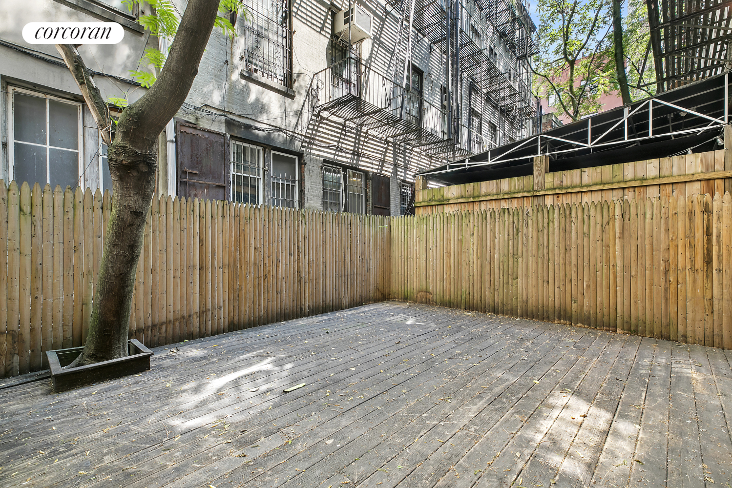 a view of a backyard of a house