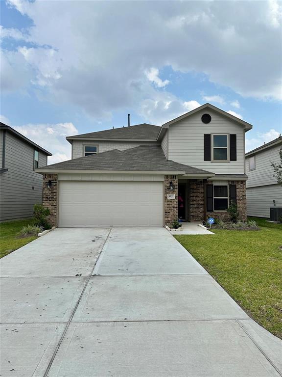 a front view of house with yard