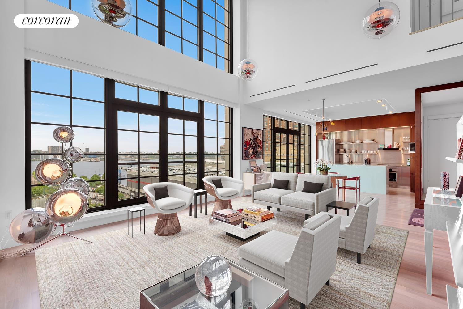 a very nice looking living room with furniture and a large window