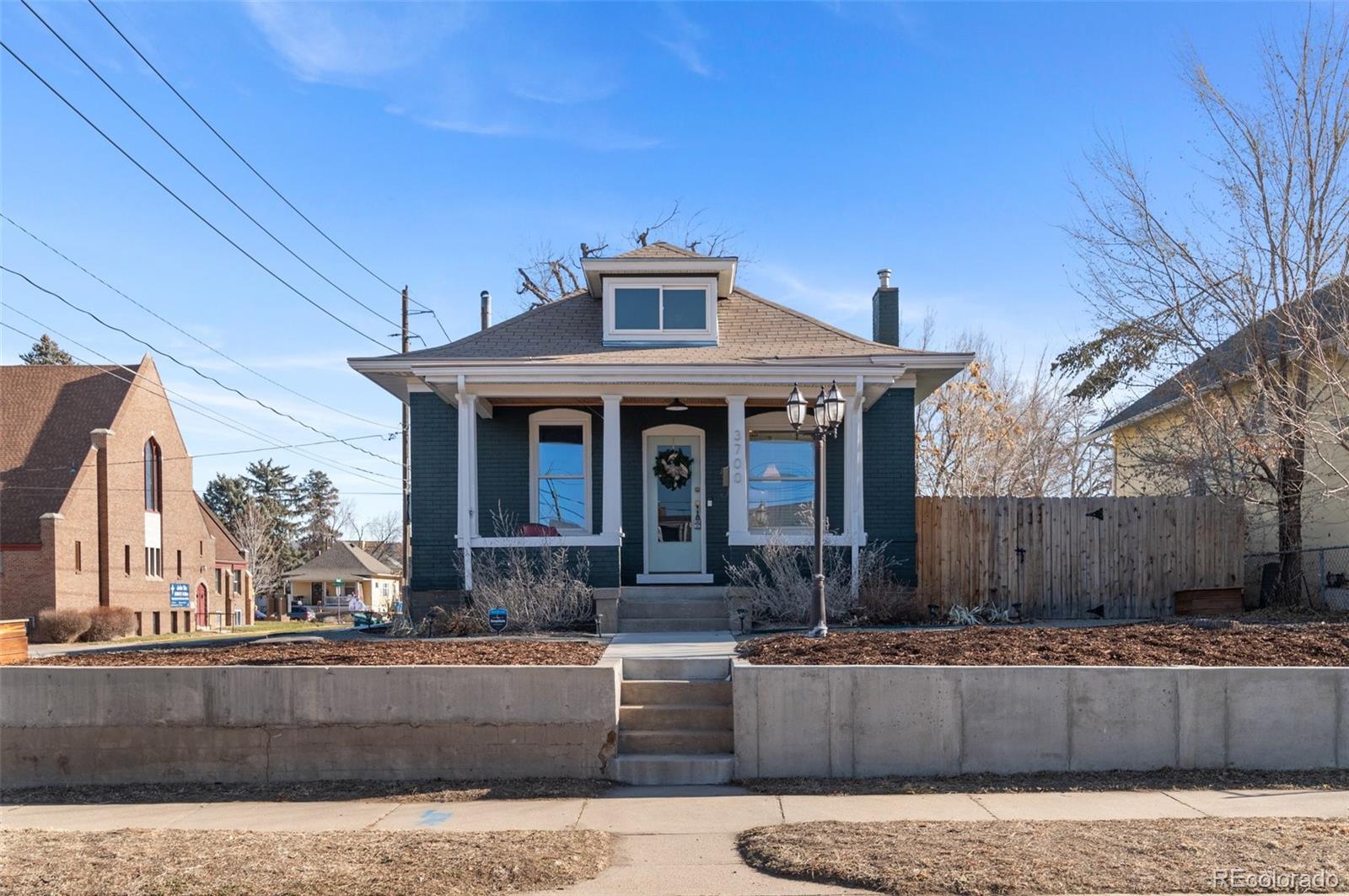 a front view of a house with garage