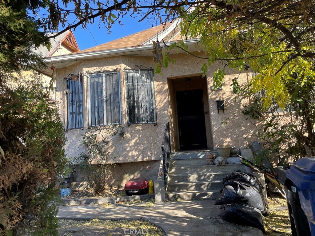 a view of a wooden door of the house