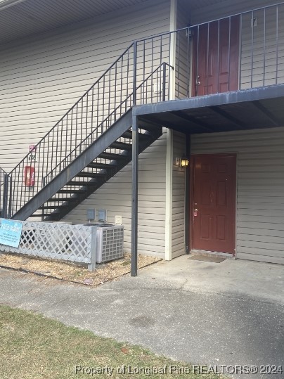 a view of entryway with a front door