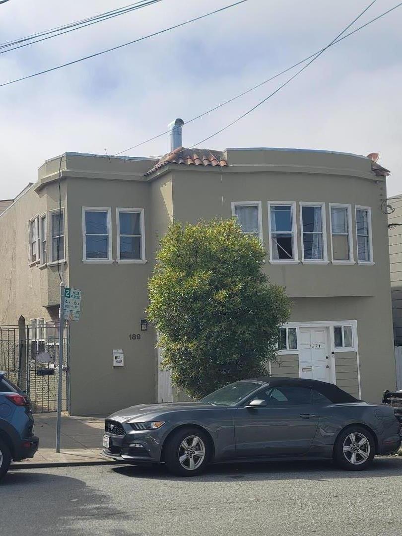 a car parked in front of a house