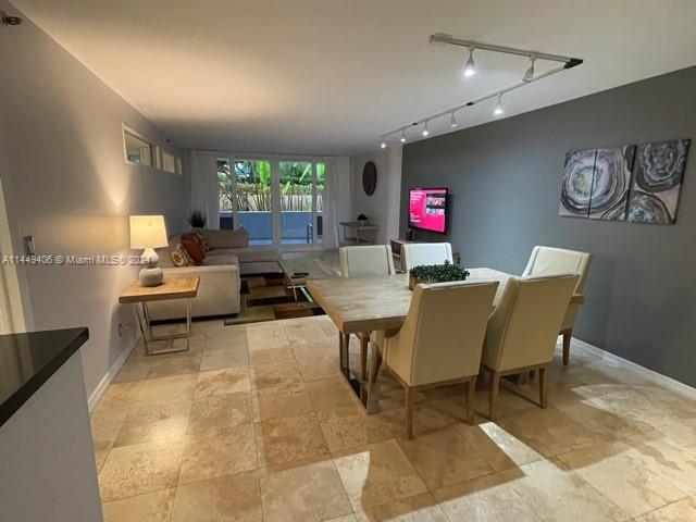 a living room with furniture and window