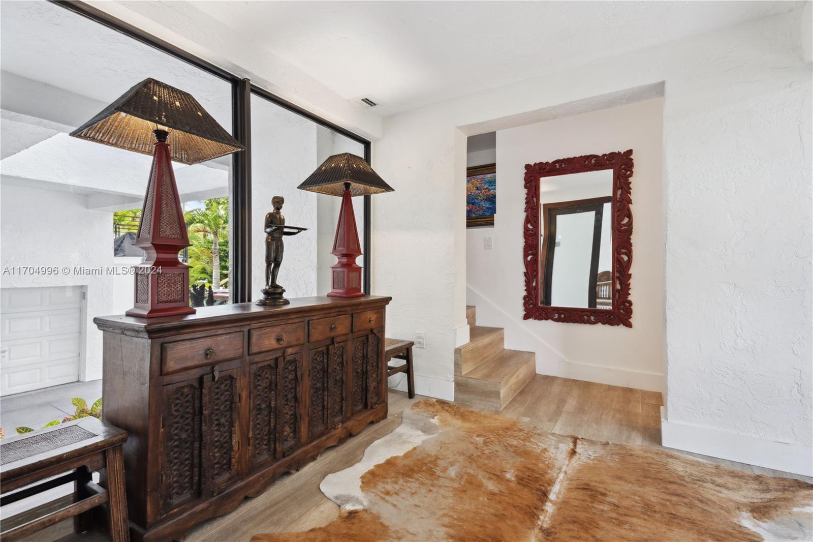 a view of a living room and bathroom