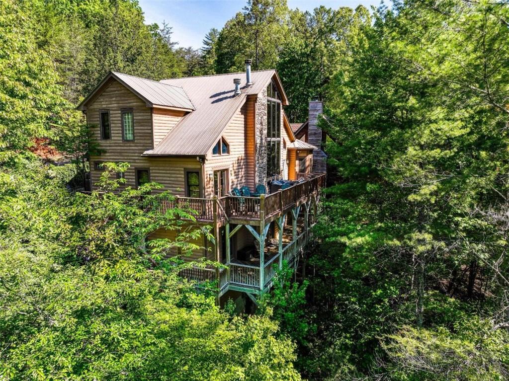 a house with trees in the background