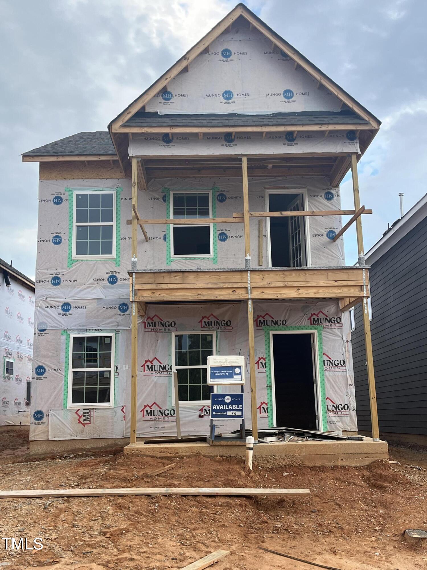 a front view of a house with a garage