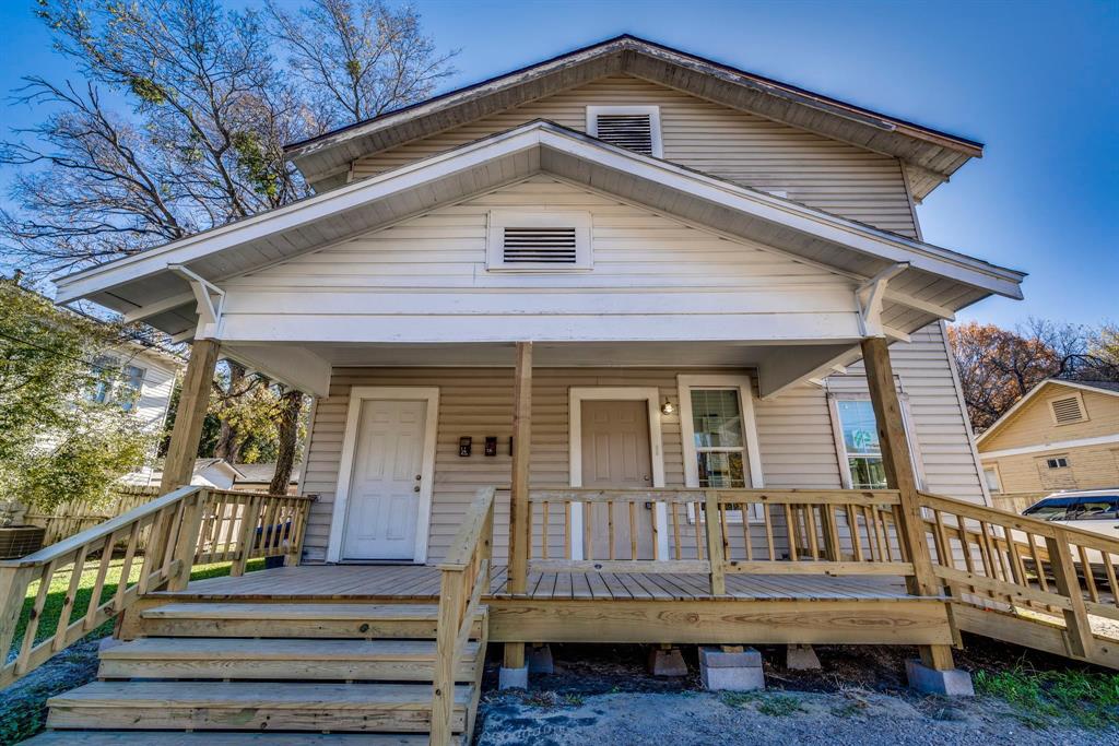 a front view of a house with a porch