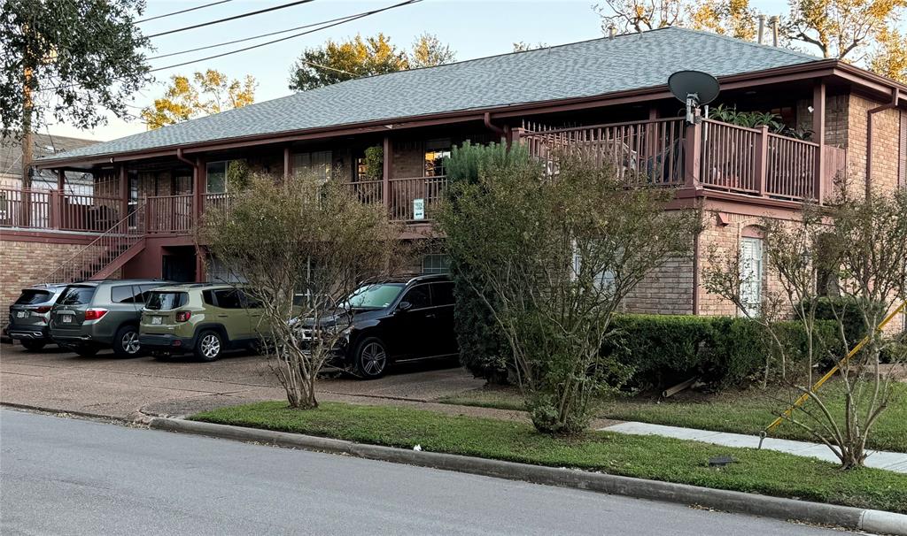 a car parked in front of a house