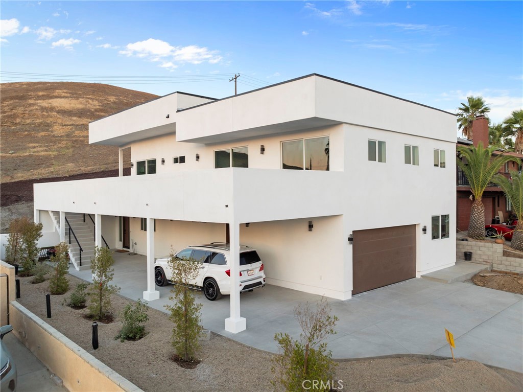 a white building with a outdoor space