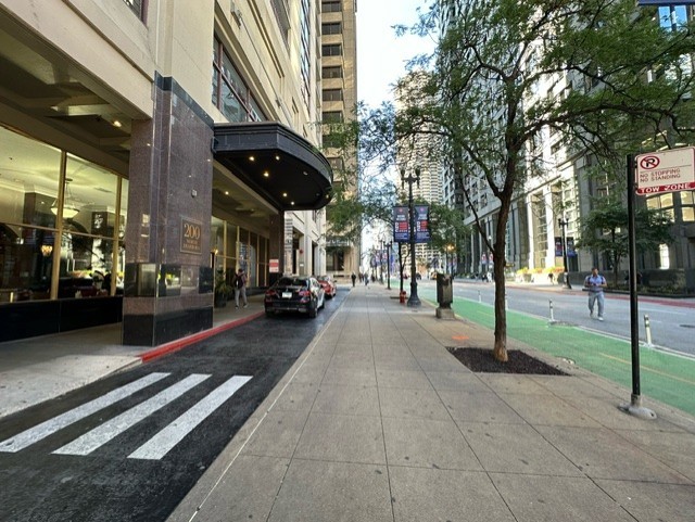 a view of street with sitting area