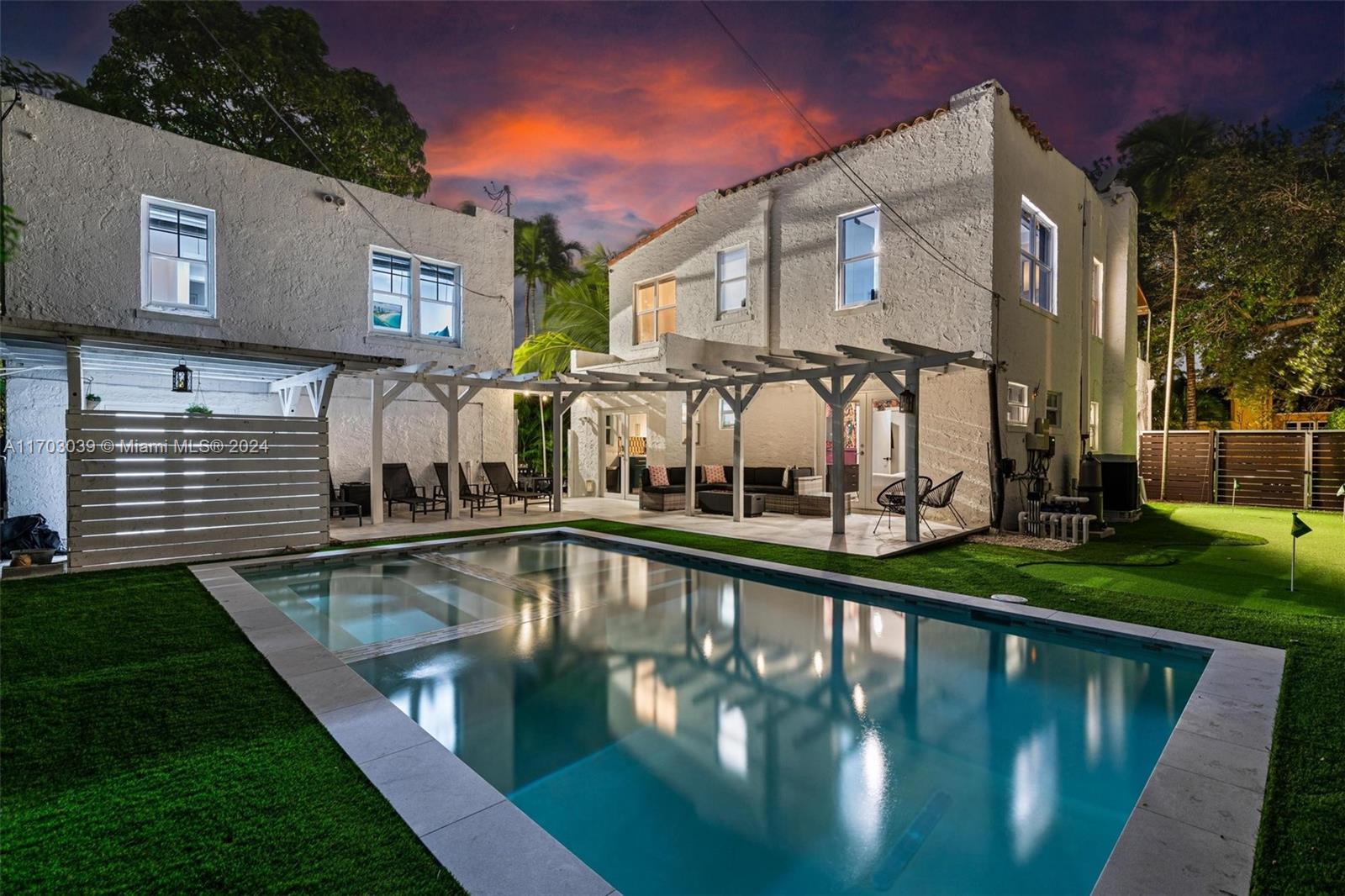 a view of a house with a swimming pool