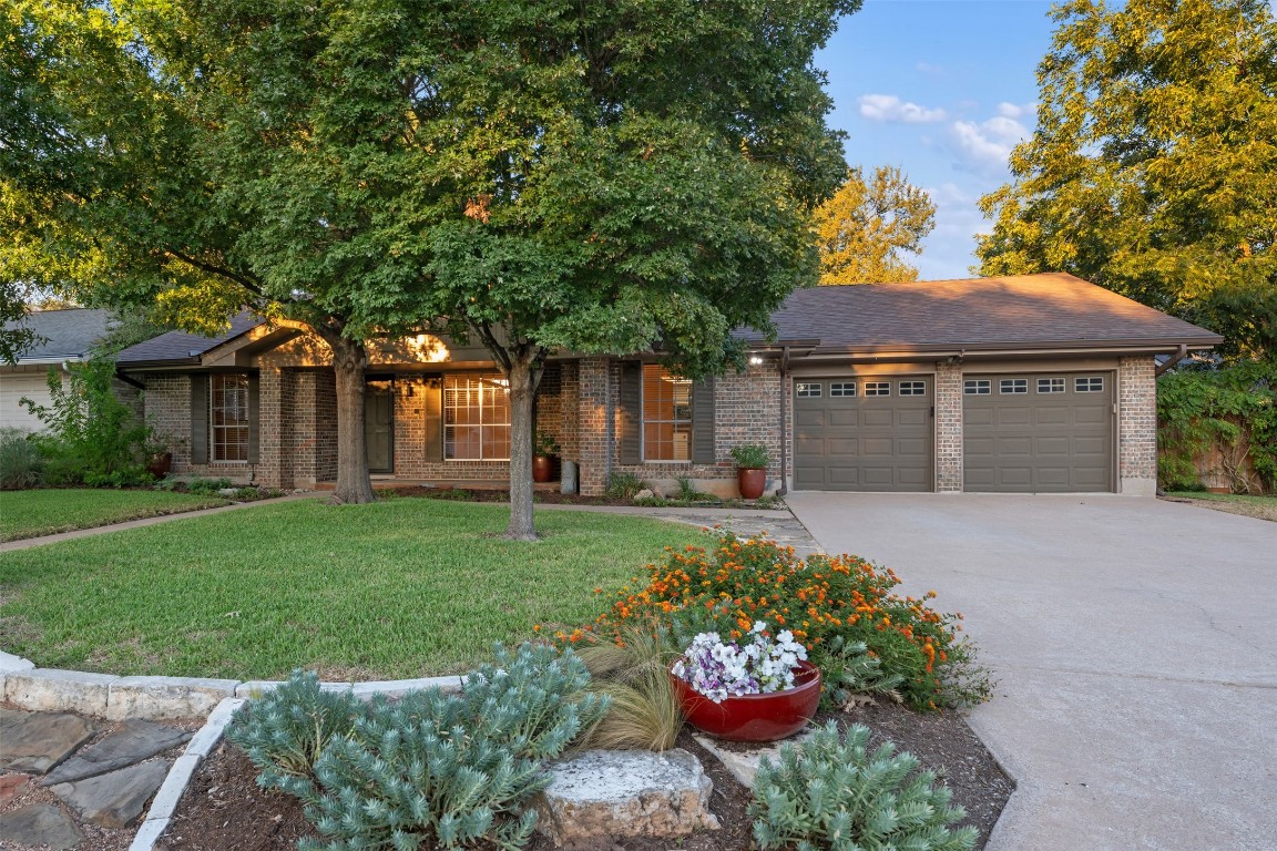 front view of a house with a yard