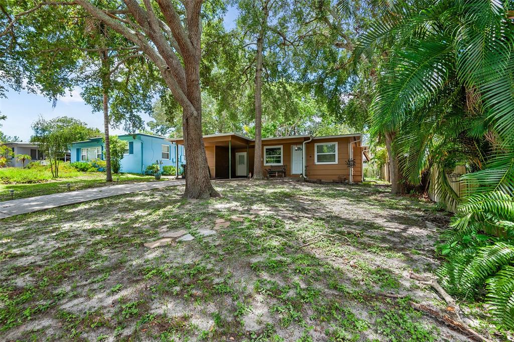 front view of a house with a yard