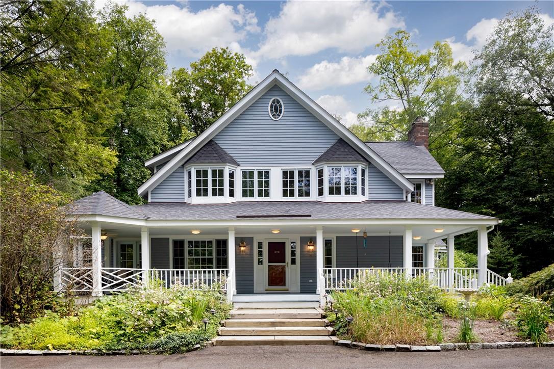 View of front of home featuring wrap around porch