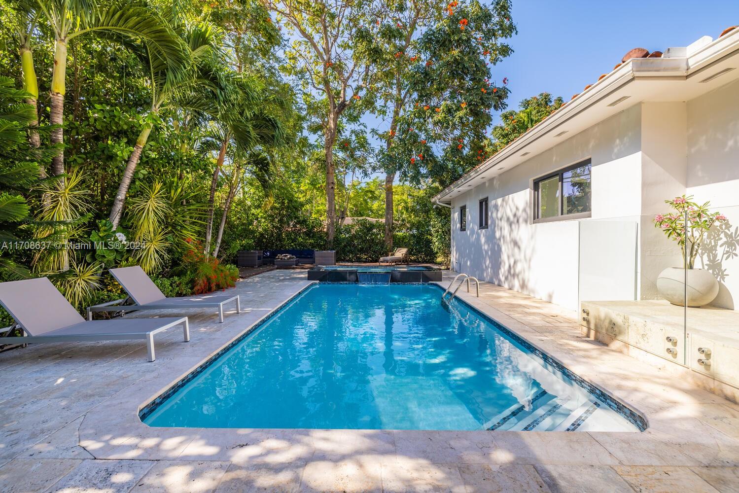 a view of a house with swimming pool