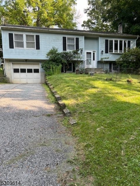 a view of a house with a swimming pool