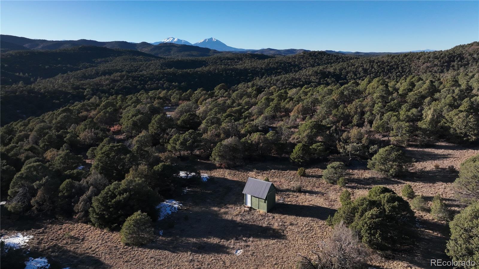 a view of a lot of trees and mountains