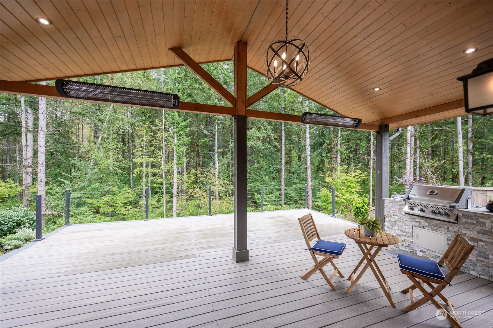 a view of a patio with wooden floor