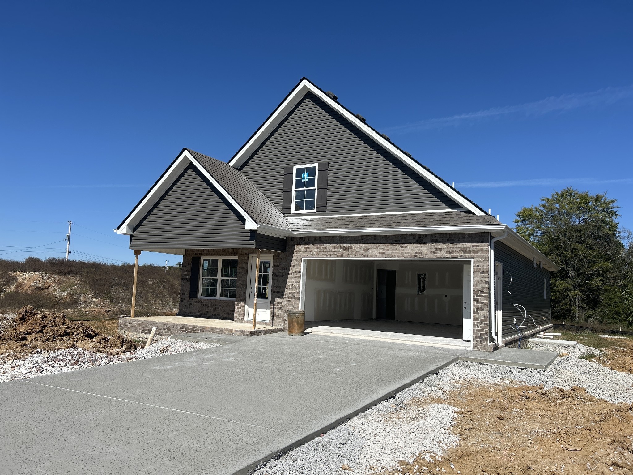 a front view of a house with a garage