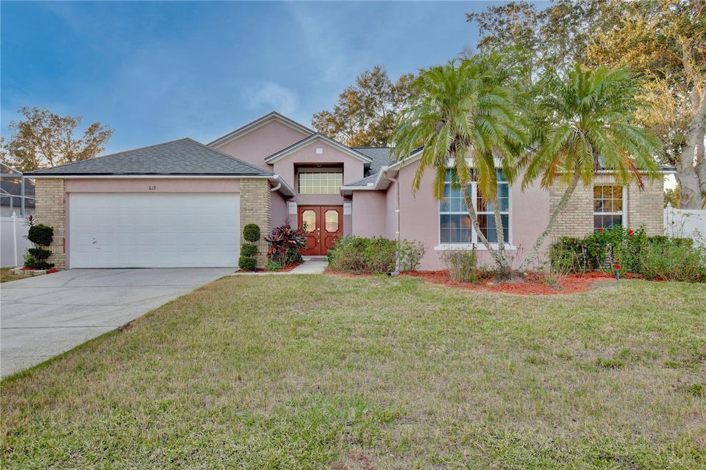 front view of a house with a yard