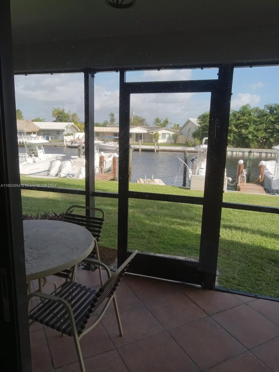 a balcony view with a outdoor seating space