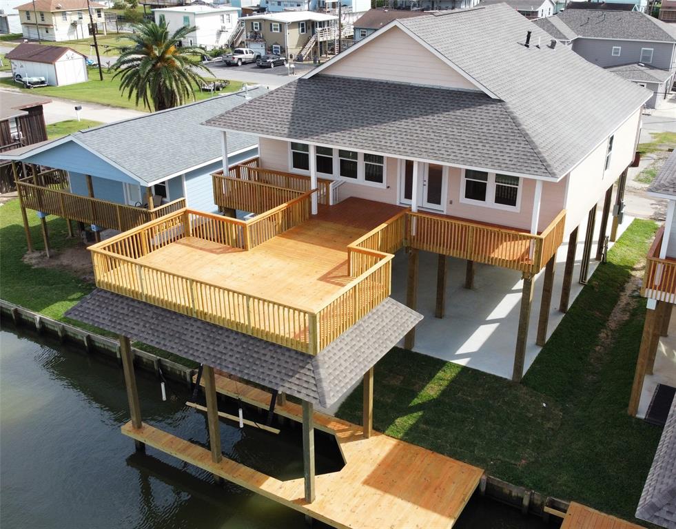 an aerial view of a house with swimming pool