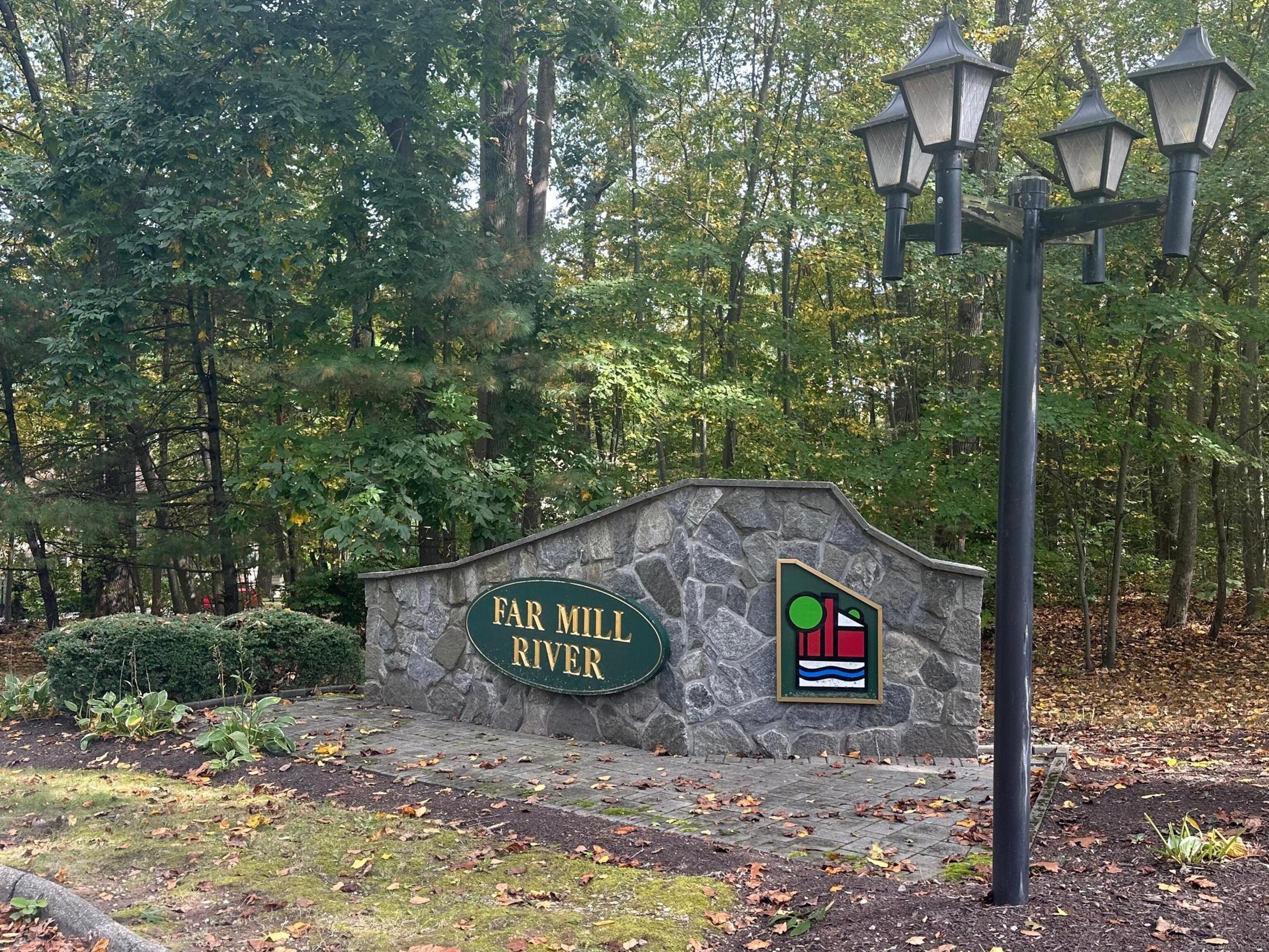 a view of outdoor space sign and tree