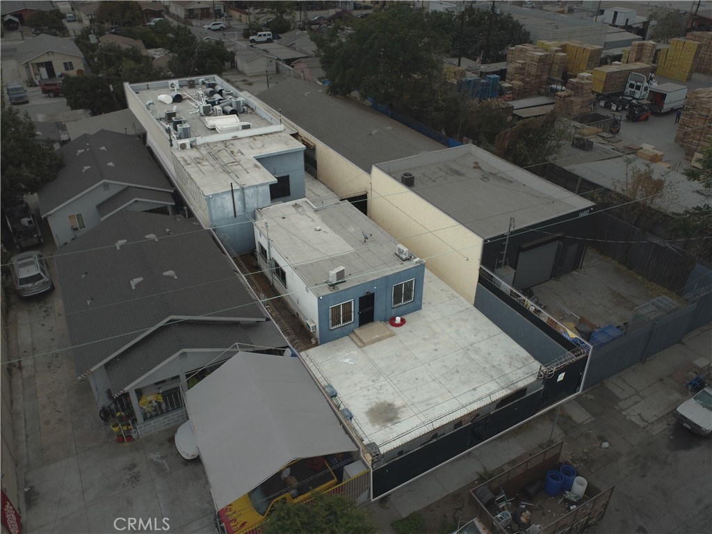 an aerial view of a residential houses with terrace