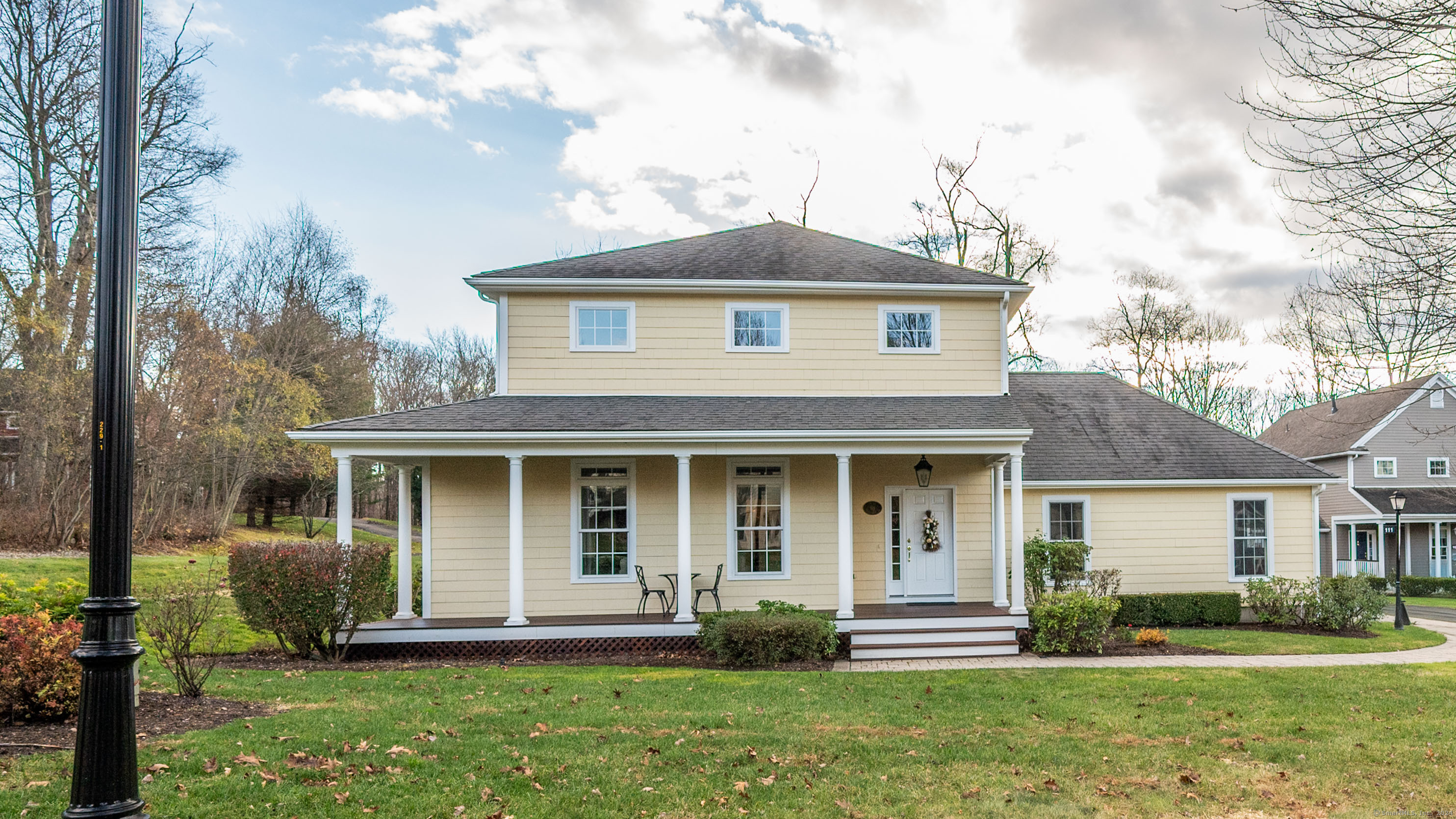 a front view of a house with a yard