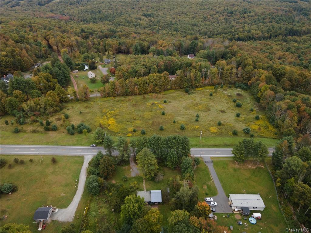 an aerial view of residential house with outdoor space