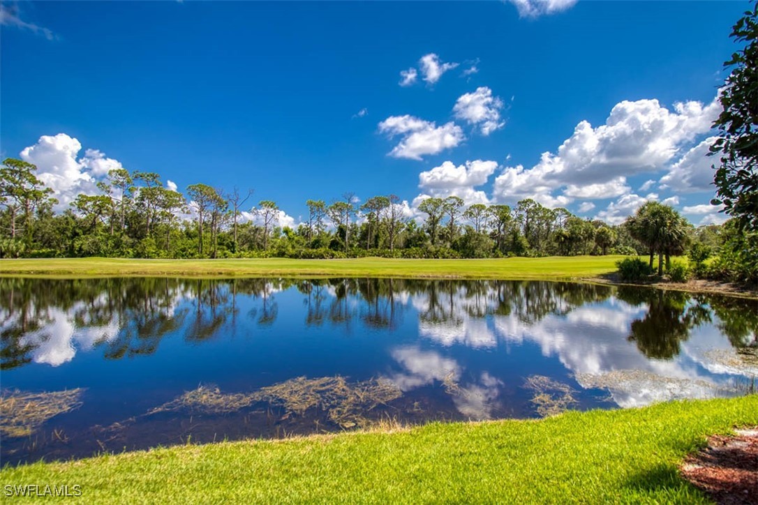 a view of a lake with a big yard