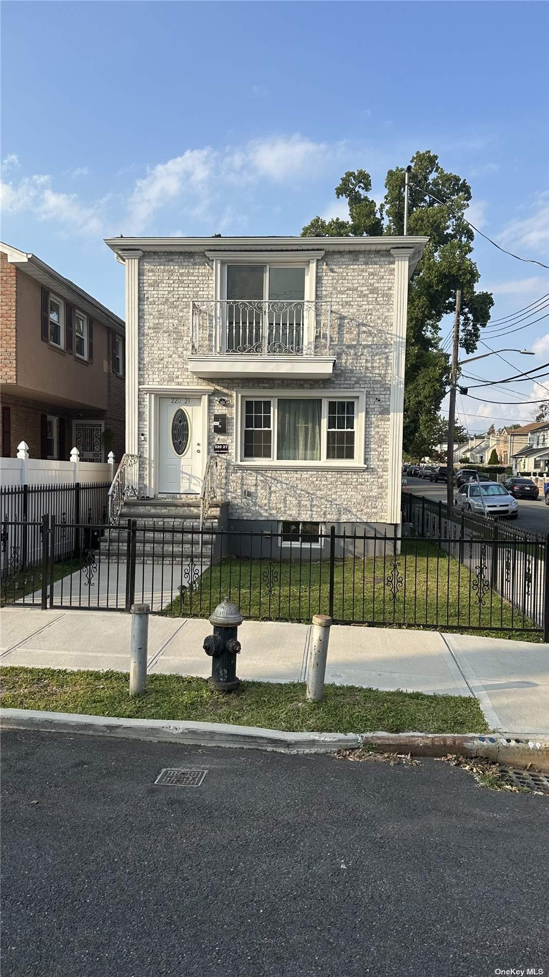 front view of a house with a street