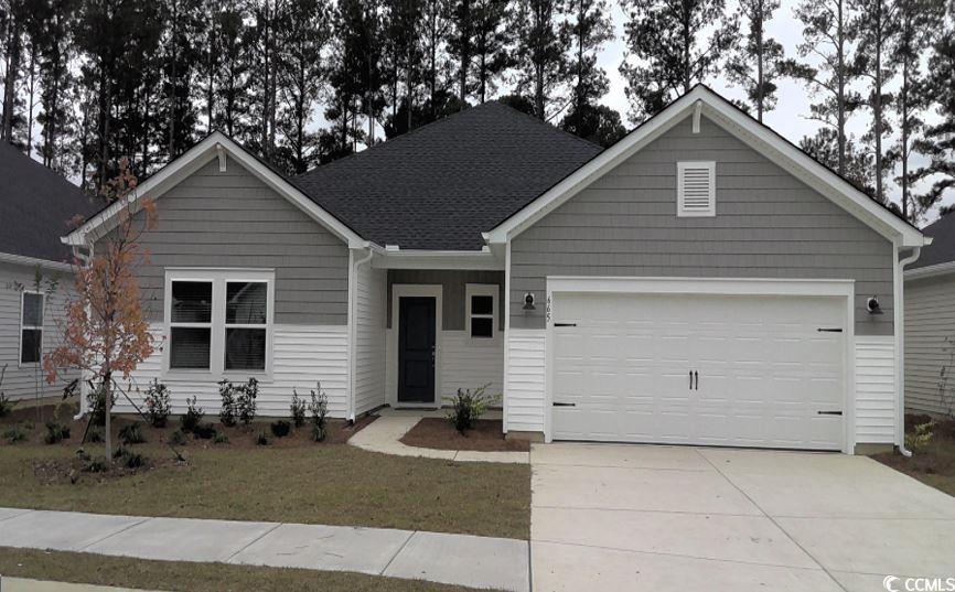 View of front of home with a garage