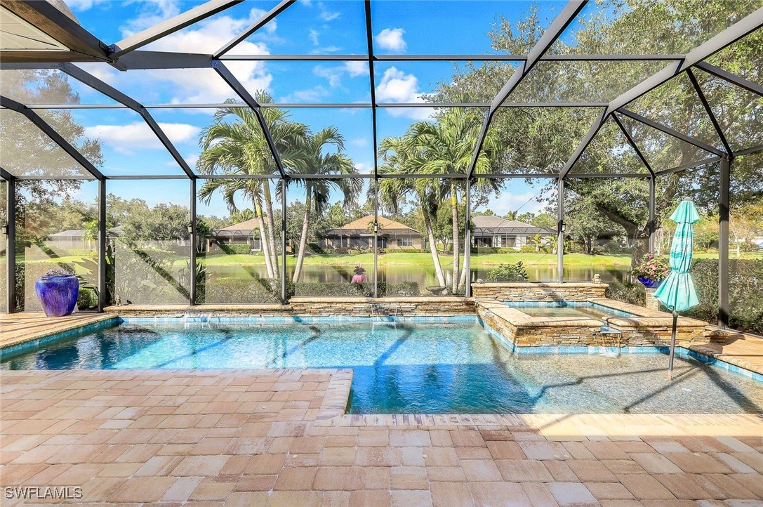 a view of a swimming pool with a patio