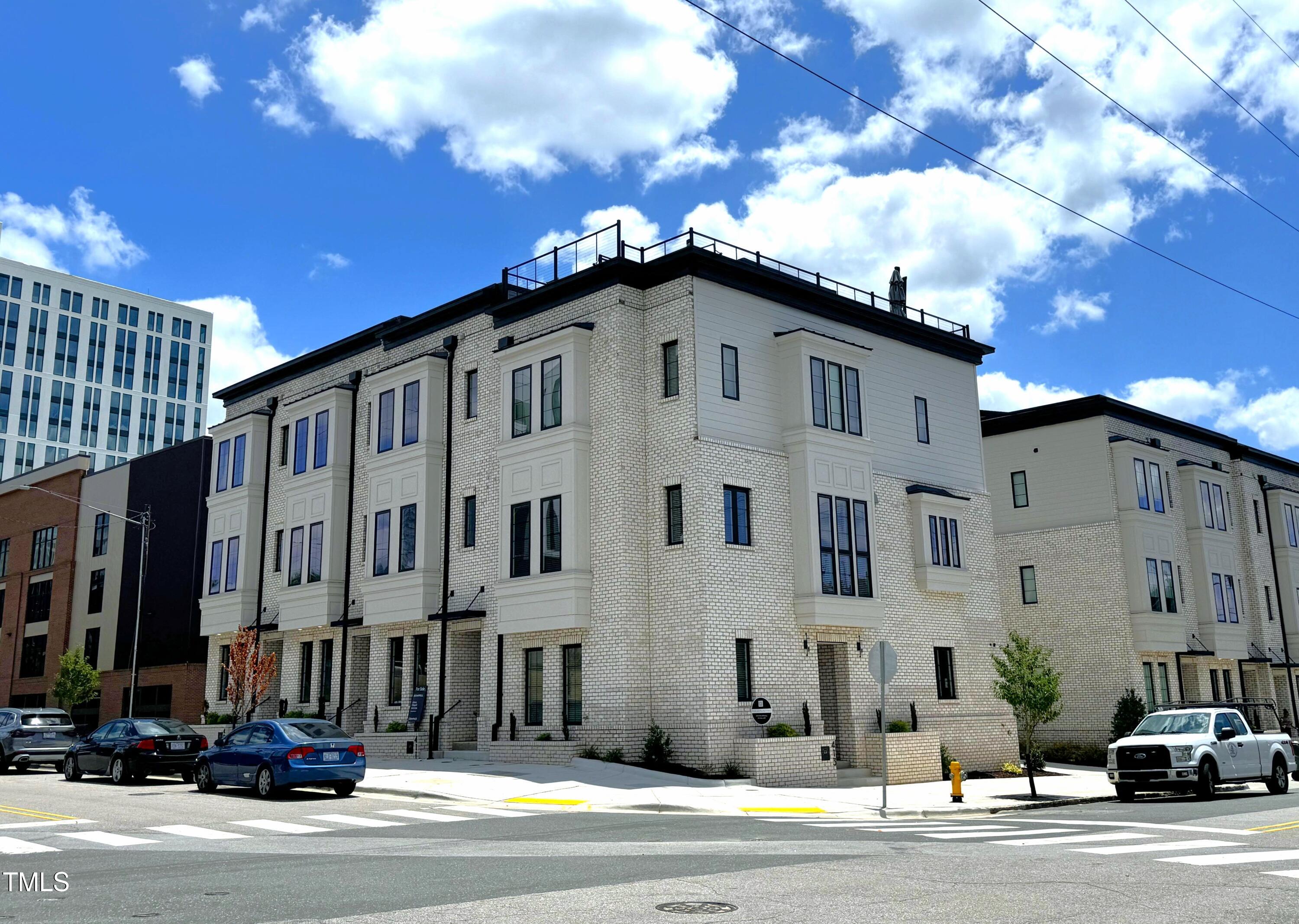 a view of a building with a street