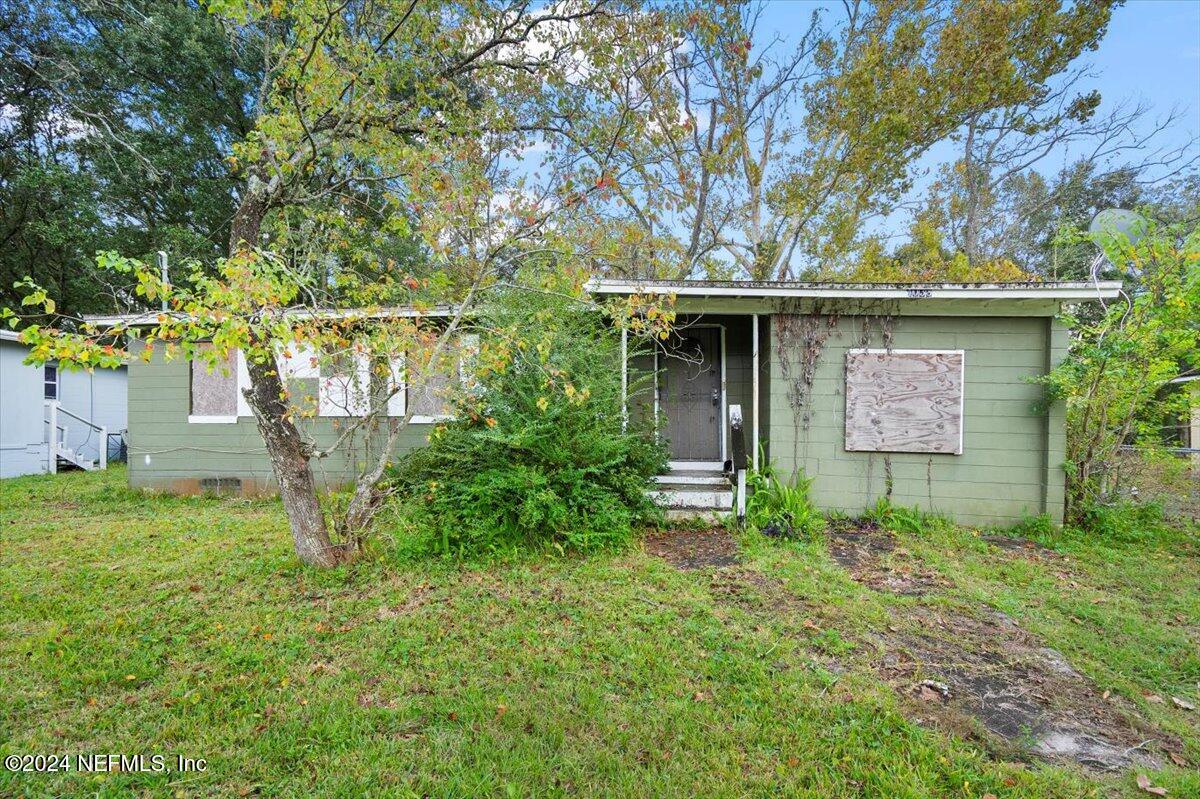 a view of outdoor space and yard