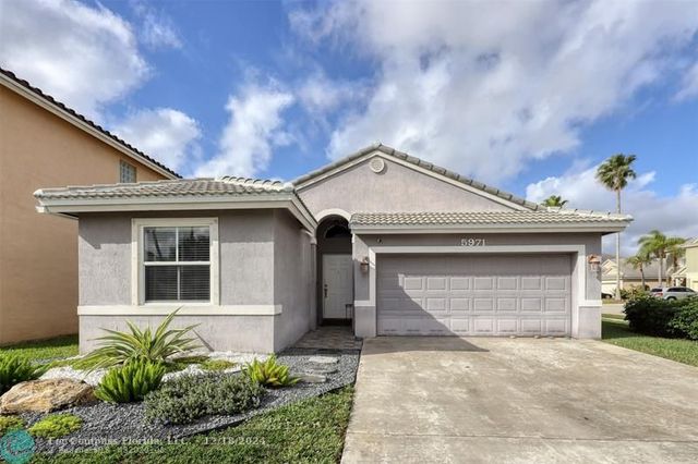 $595,000 | 5971 East Grand Duke Circle | Tamarac