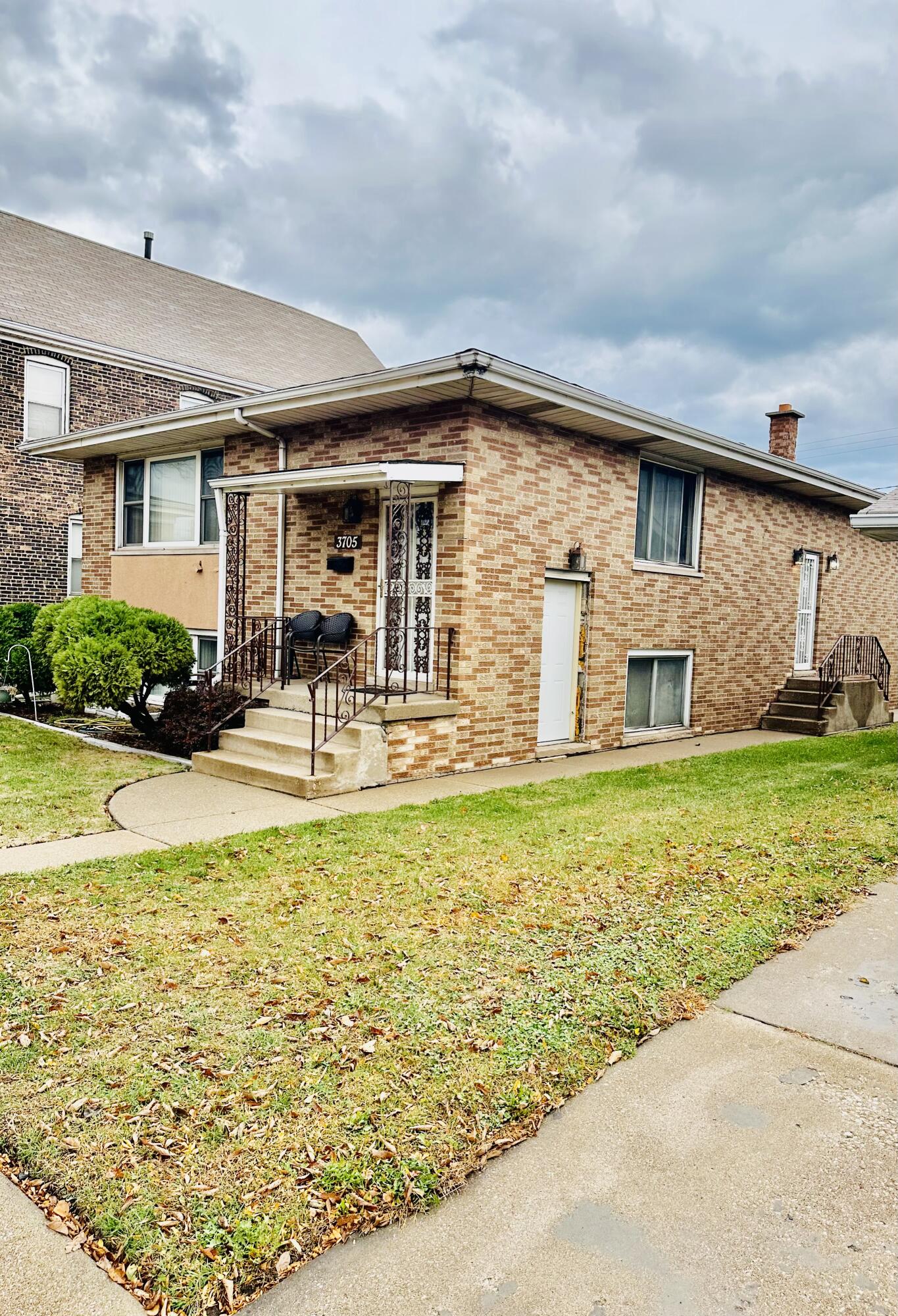 a front view of house with yard