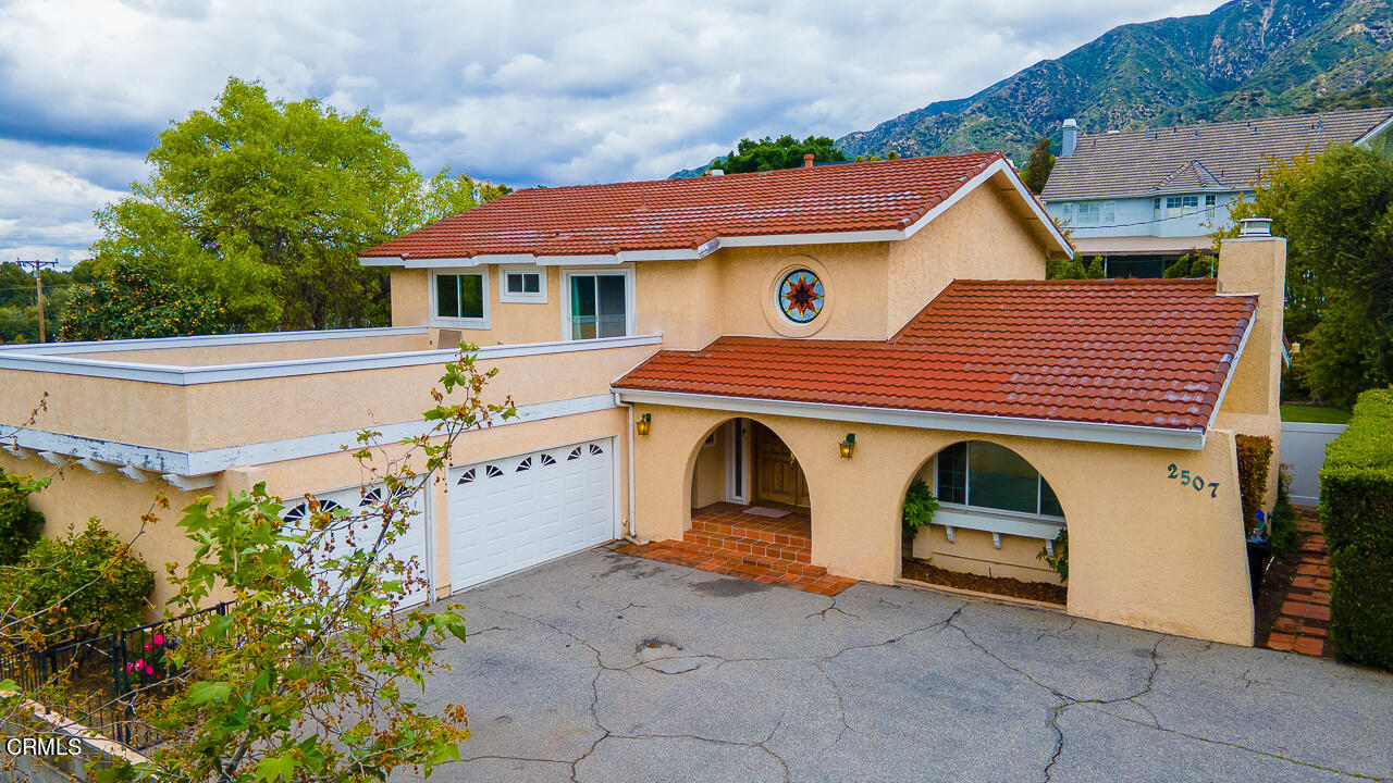 a view of front of house with a garage