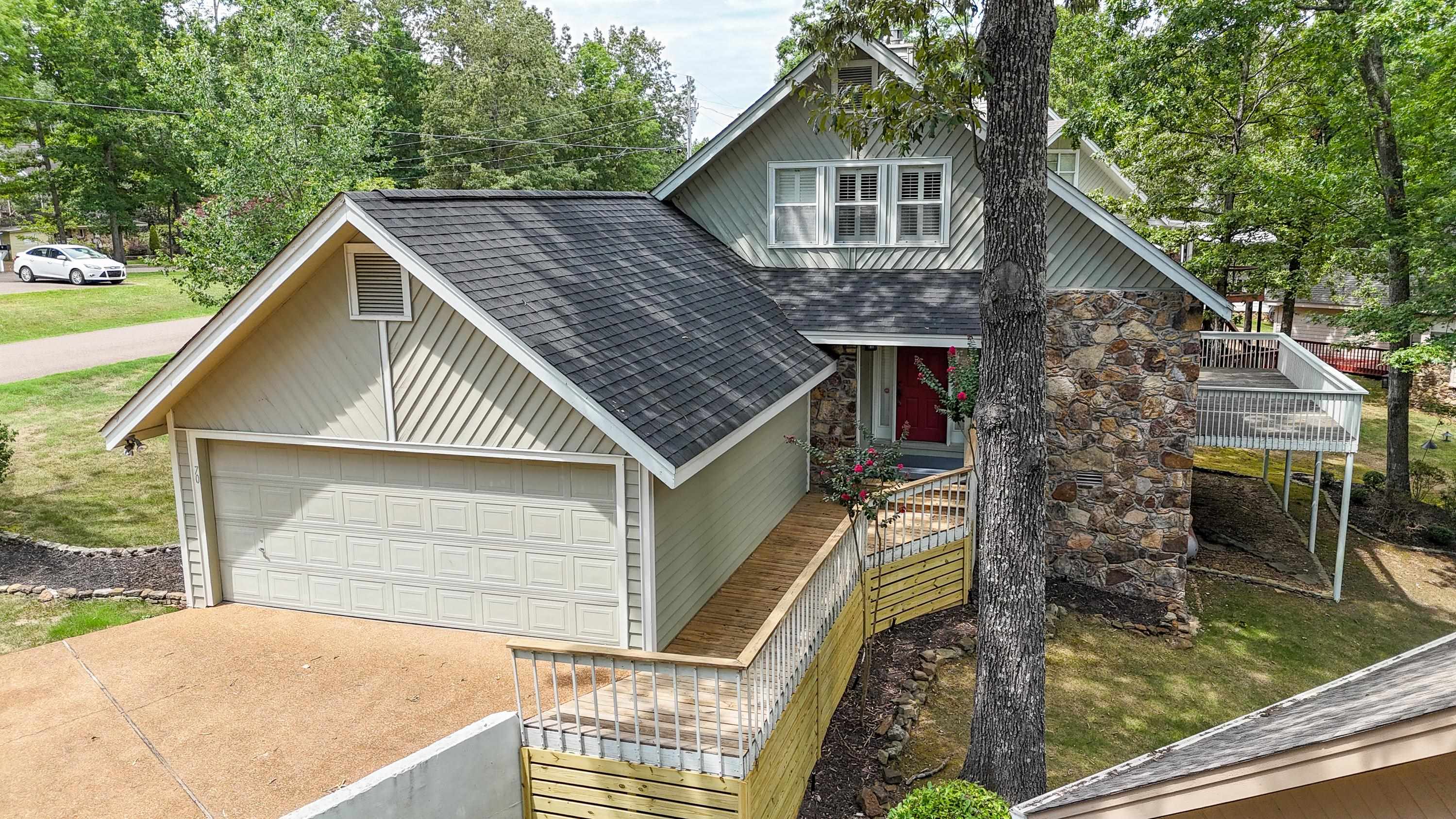 View of front of property with a garage