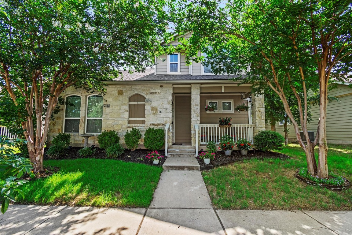 front view of a house with a yard