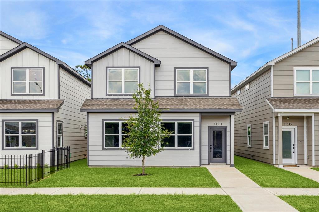 a front view of a house and a yard