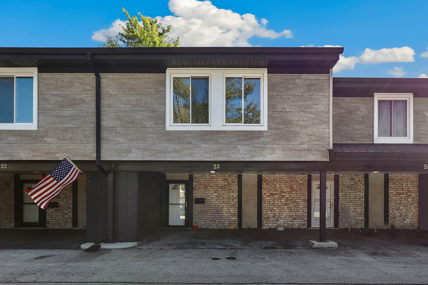 a front view of a house with a entryway