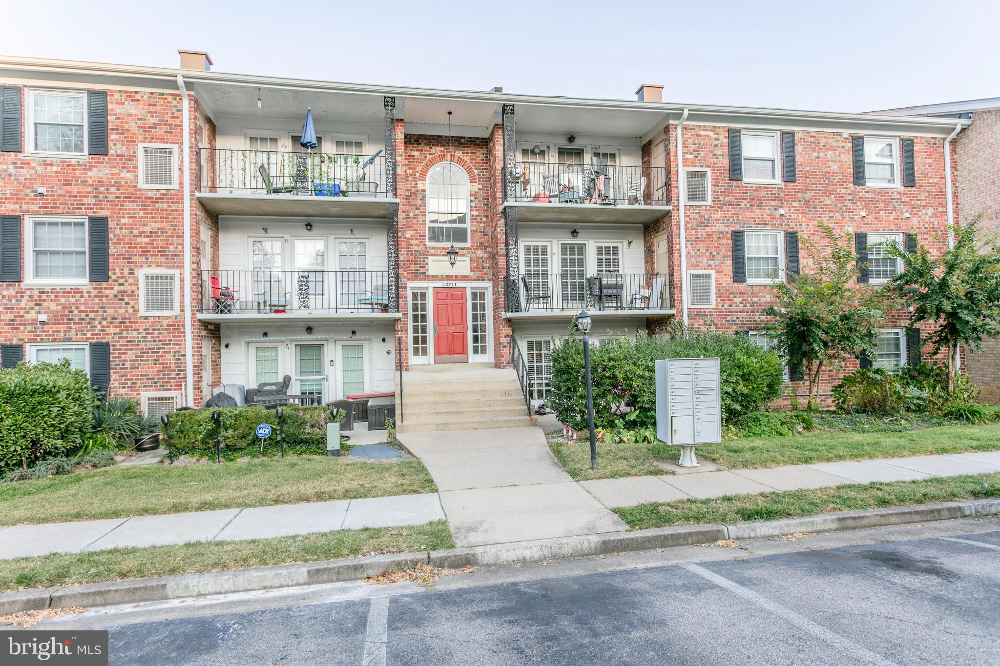 a front view of a multi story residential apartment building