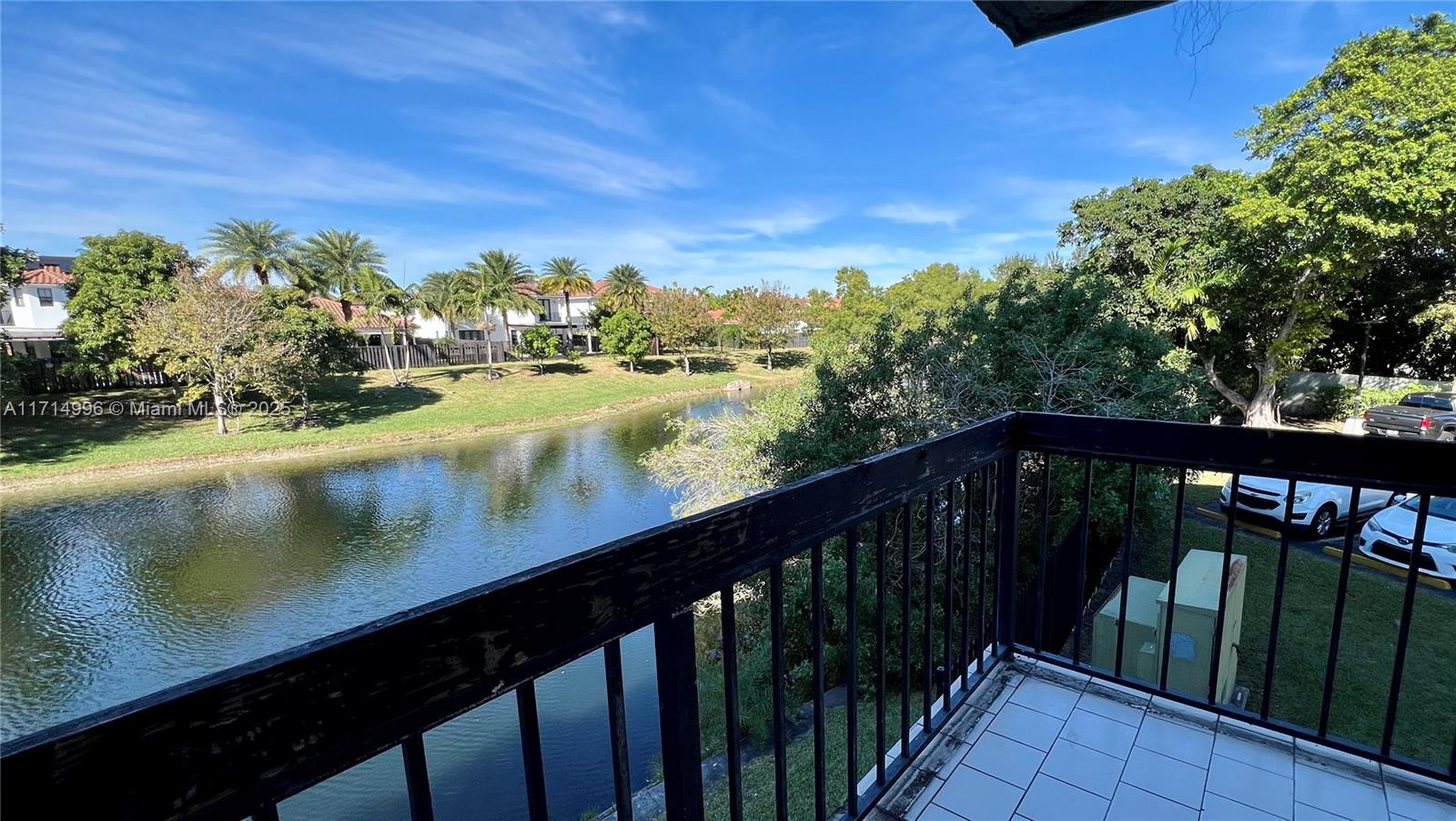 a view of swimming pool from a balcony