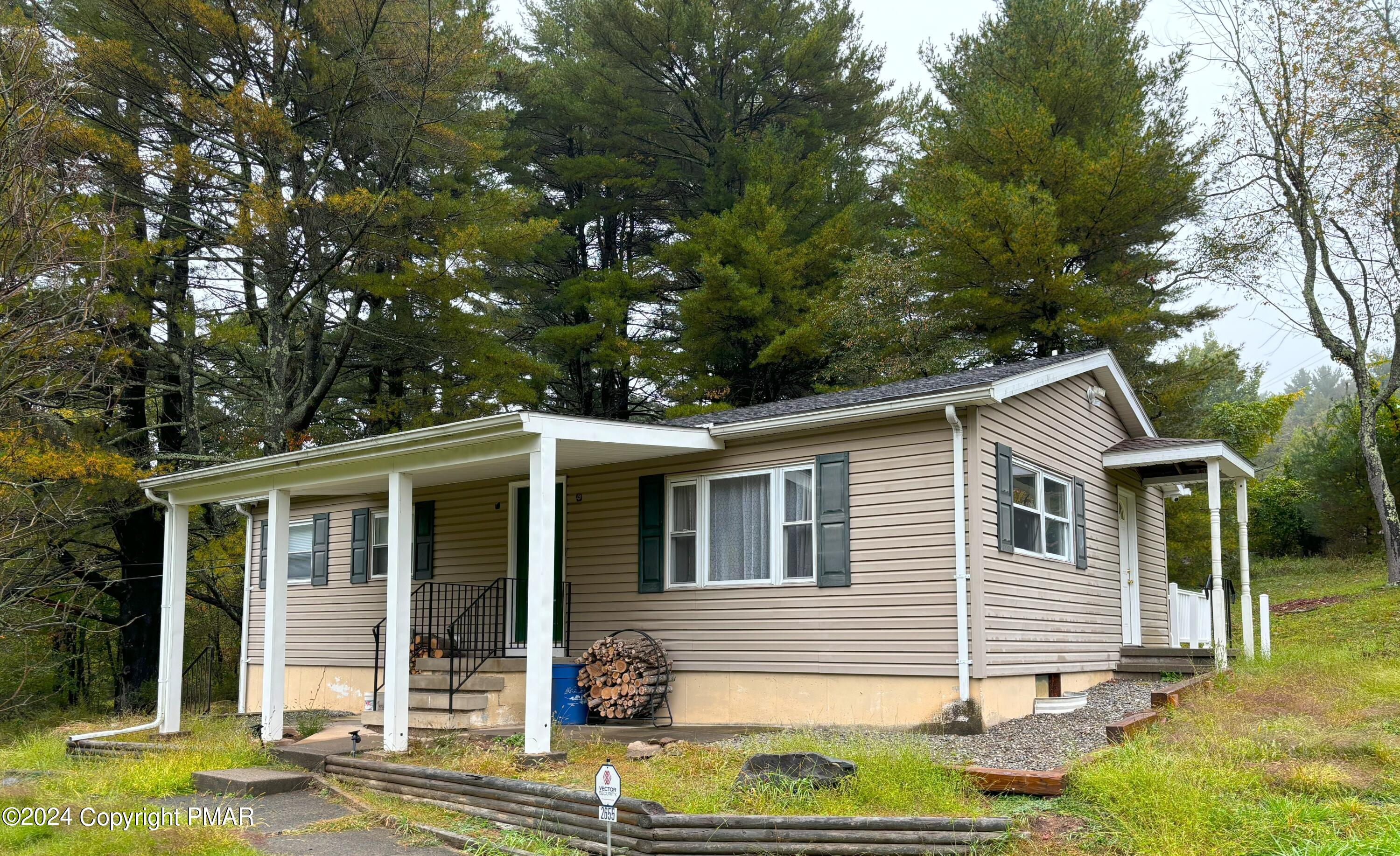 front view of house with a yard