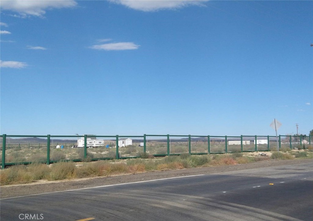 a view of a swimming pool with a road